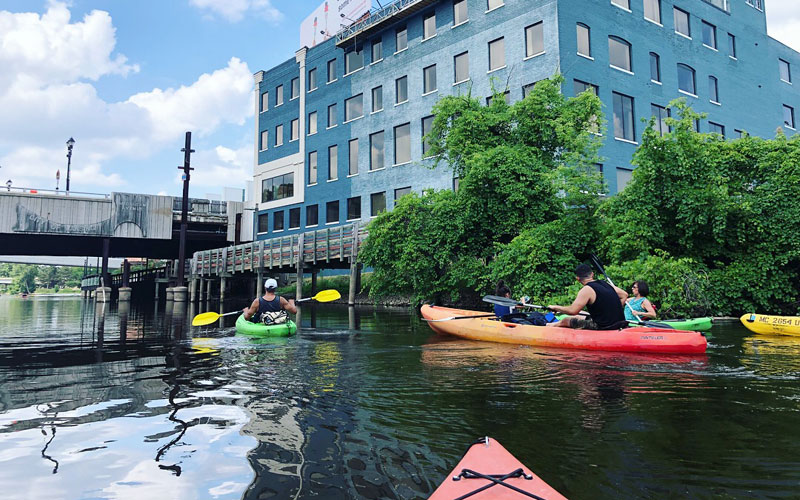Paddling down the Grand River in Lansing, Lansing kayak, Lansing canoe