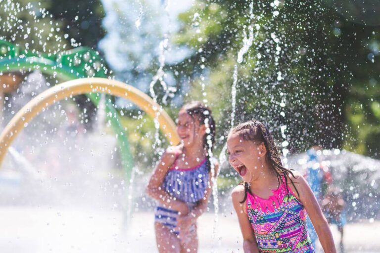 girls having fun at splash pad