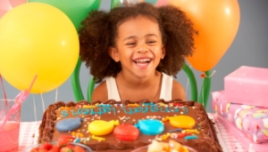 Birthday Party Planner Kid Girl with birthday cake Lansing Michigan