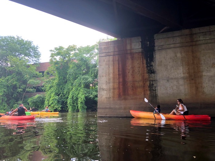 River Town Adventures Grand River Downtown Lansing Kids Kayak Tandum under bridge