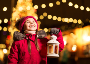 Christmas-Events-Holiday-Guide-Girl-looking-up-at-lights-feature