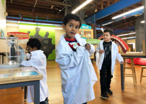 Impression-5-kids-playing-in-lab-coats