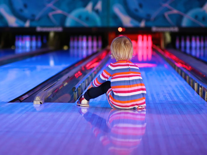 Kids-Bowl-Free-Girl-Glow Bowling-Kalamazoo Kids Bowl Free