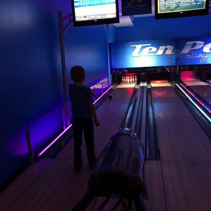 Kids-Bowl-Free-Lansing-boy-Glow-Bowling