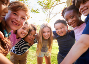 Summer-Camp-Kids-in-huddle-feature