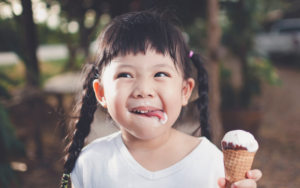 ice cream in lansing feature girl with ice cream in her hand