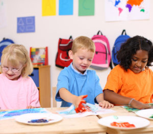 Preschool-guide-kids-playing-together-at-a-table