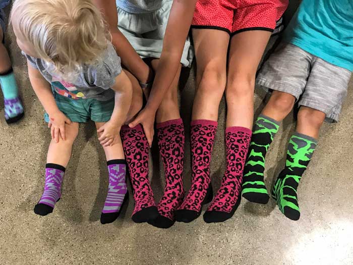 Defy_socks-group-wearing-together