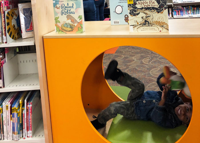 East-Lansing-Library-Story-Time-Boy-Playing-in-Reading-Nook-with-puppet