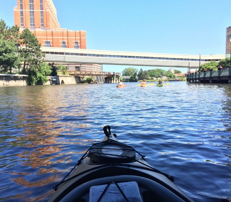 Places to Kayak Lansing feature kayaking with friends in downtown lansing