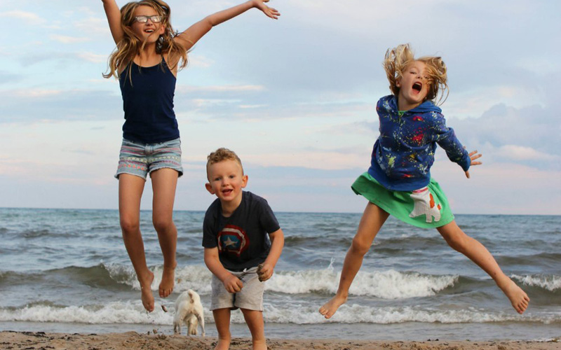 Beach-Jumping-Kids-Sunset