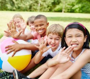 Summer Camp Guide Lansing Michigan 2021 feature kids smiling